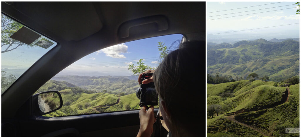 Landschaftsaufnahme in Costa Rica und ein Schulterblick bei der Fotografin, die aus dem Beifahrerfenster heraus fotografiert.