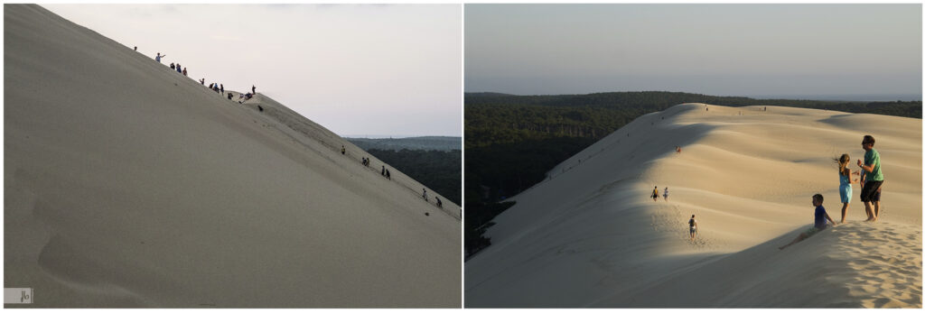 Menschen an der Dune du Pilat erfreuen sich an der großen Sanddüne in Frankreich